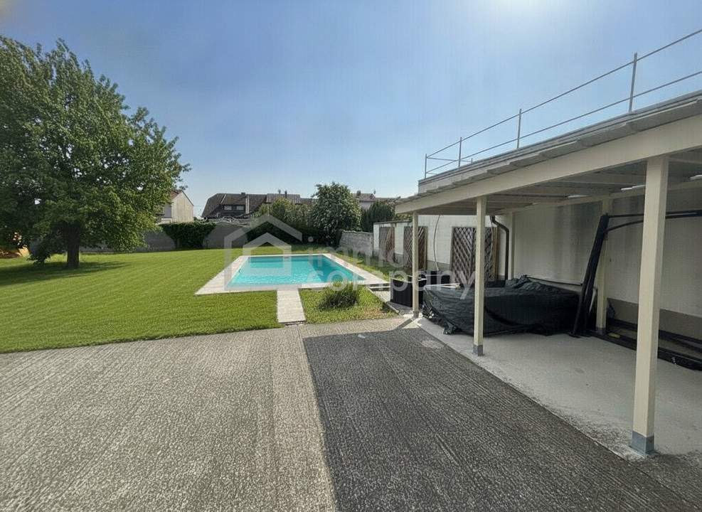 Wohnkomfort! Saniertes & Modernisiertes Einfamilienhaus auf Doppelgrundstück in Lassee, mit Garten, Carport & Salzwasserpool!