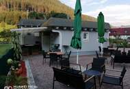 Langfristig vermietetes Café mit Garage!