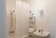 Befristet vermietete: klimatisierte 2-Zimmer-Wohnung mit hofseitiger Terrasse &amp; optionaler Garagenstellplatz!