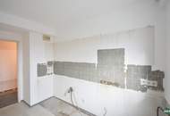 Sanierungsbedürftige Eigentumswohnung mit großzügiger Terrasse