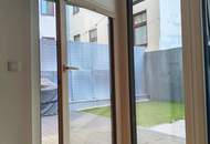 Exquisites Neubau-Juwel im Botschaftsviertel: Moderne 3-Zimmer-Wohnung mit Sicherheitsfeatures, Eigengarten und Wohnküche mit Kochinsel