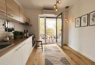 Exklusive 3-Zimmer-Dachgeschoss-Oase mit sonnigem Balkon & grünem Innenhof