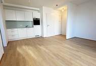 AUGARTEN-NÄHE, DACHGESCHOSS, klimatisierte 43 m2 Neubau mit 6 m2 Balkon, Wohnküche, 1 Zimmer, Duschbad, Parketten, Erstbezug