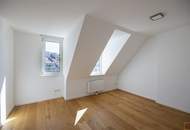 Dachgeschoßwohnung mit eingeschnittener Terrasse, vier Schlafzimmern und schönem Fernblick