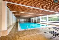Provisionsfrei: Traumwohnung mit Kamin und Balkon in Nussdorfer Wohnanlage mit In- und Outdoorpool! Garage verfügbar!