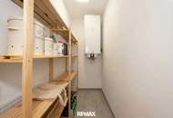 NEUBAU | Hochwertige Gartenwohnung mit traumhafter Küche, Terrasse und Garage in ruhiger Grünlage!