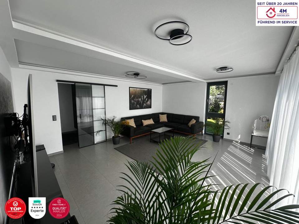 Hochwertige Maisonette mit großzügigem Eigengarten und Garage – Wohnen in Ruhelage