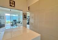 Privates Wörthersee-Panorama auf höchstem Niveau – Penthouse in der Villa Onda mit Sauna & 2xTG