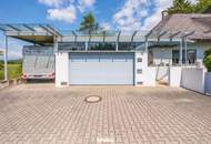 Einzigartige Liegenschaft mit Kachelofen, Wintergarten und parkähnlichen Grundstück in Toplage