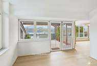 Panorama-Loge: Penthouse mit Seeblick in Seeboden. Carport. Neuwertig.