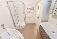 Sofort beziehbar! Neubauwohnung mit neuer Küche, 10m2 Balkon, Parkplatz und Grünblick - Fernwärme