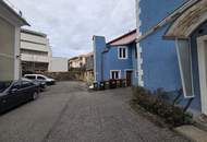 Mehrparteienhaus mit Parkplätzen im Zentrum von Spittal