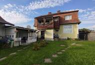 Mehrfamilienhaus mit Gewerbegrundstück
