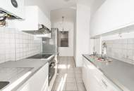 Altbau-Charme mit 3 Zimmern und Süd-Balkon in zentraler Lage