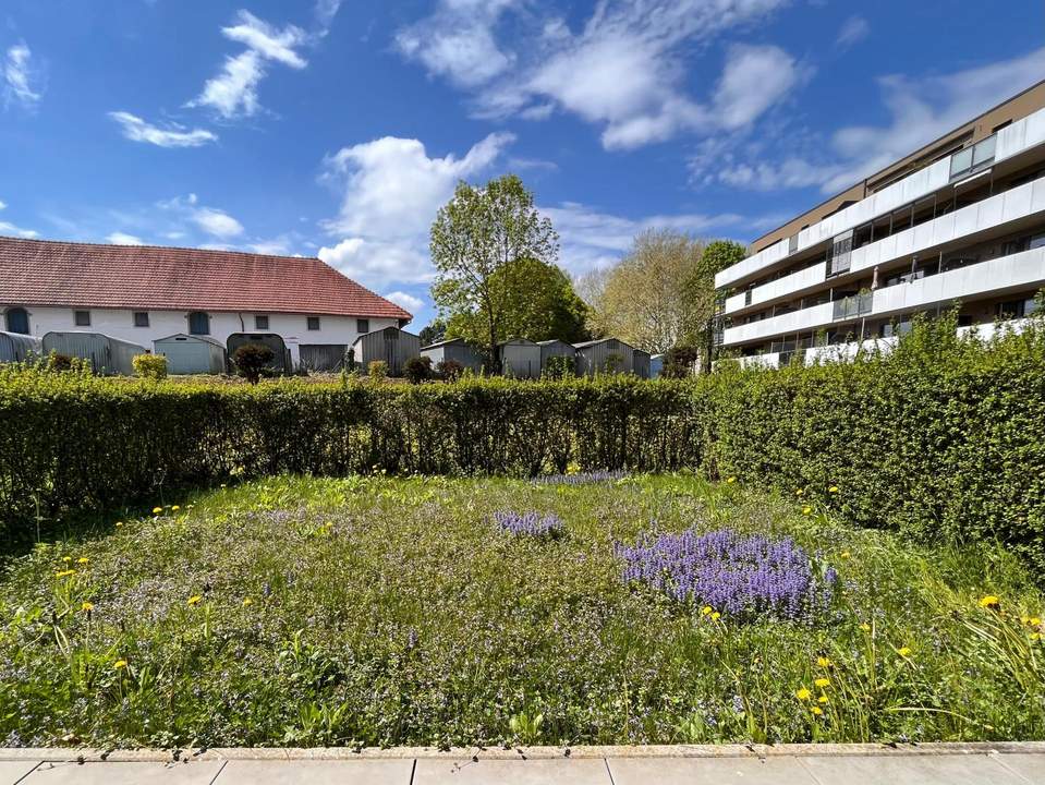 Moderne Wohnung mit Garten und KFZ-Stellplatz