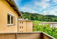 Dachgeschossjuwel in Wattens mit Panoramablick, Balkon & Ofen – geringe Betriebskosten