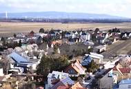 Dachgeschosswohnung in Niedrigenergiebauweise und 23m² Terrasse mit spektakulärem Fernblick.