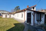 RENOVIERUNGSBEDÜRTIGES EIN-ZWEIFAMILIENHAUS IN ZENTRALER LAGE