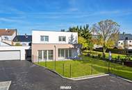 Erstbezug: Einfamilienhaus mit XL-Garten, Doppelgarage & Carport – Top 5