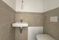 Erstbezug | Sonnige 3-Zi-DG-Wohnung mit Wien-Blick + 8m² Balkon | Klima | Lift