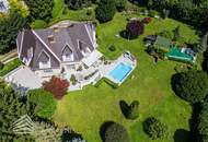 Beeindruckende Villa mit gepflegtem Garten und Pool als Investment