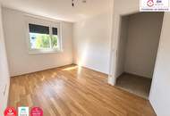 Moderne 3-Zimmer-Neubauwohnung mit Balkon ins Grüne