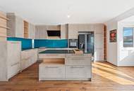 Stilvolles Wohnen auf drei Ebenen mit Dachterrasse &amp; Weitblick. Urban und naturnah zugleich!