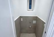 Erstbezug - Qualitativ hochwertigst sanierte Altbauwohnung im Innenhof 1. Stock - nur ca. 3 Gehminuten zur U3 Station Kardinal-Nagl-Platz