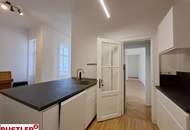 Stuck, Kachelofen, Flügeltüren: Altbauliebe mit Klopfbalkon