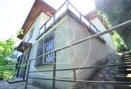 Sanierungsbedürftiges Einfamilienhaus mit Fernsicht in Grünruhelage!