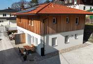 Etabliertes Ferienhaus-Ensemble am Millstätter See. Zwei moderne Häuser mit bestehender Vermietung. Investment.