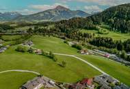 Baugrundstück mit atemberaubendem Kaiserblick in Going