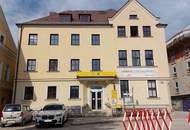 Postgebäude mit Geschäfts- Büro- und Wohnflächen