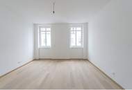 Modern gestaltete Altbauwohnung mit großzügigem Wohnbereich und südseitigen Außenflächen
