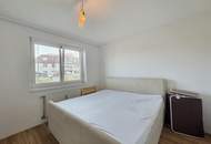 Geräumige Erdgeschoß Eigentumswohnung mit Ost- Loggia und West- Balkon sowie ein eigenes Carport