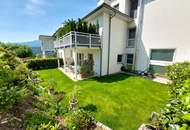 Miete. Neuwertige Wohnung mit Terrasse und Garten in Seeboden. Tiefgarage.