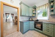 High-end living in a peaceful green location! A feel-good retreat in a class of its own: tradition meets state-of-the-art comfort!