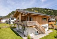 Traditionelles Einfamilienhaus mit Bergblick