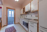 DAS INVESTMENT IN BESTLAGE! Wohnung sowie Geschäftslokal, Praxis oder Büro- 2 Garagen im Innenhof