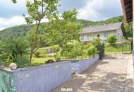 Charmantes Einfamilienhaus mit großem Naturgarten, Gewölbekeller und herrlichem Ausblick