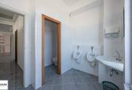 Grundstück mit vier Baukörpern - Büro-, Geschäfts- und Gewerbegebäude inkl. Parkplätzen in Vösendorf