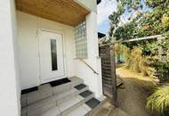 Entzückendes Einfamilienhaus mit Naturgarten, Nebengebäude und Carport