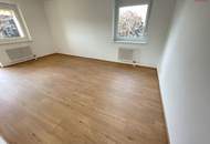 Neu sanierte 2-Zimmerwhg. im Grünen – mit Balkon & Garage!