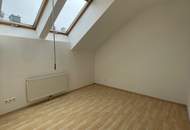 Schöne, geförderte 3 Zimmer-Dachgeschosswohnung mit Balkon