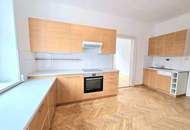 Mehrparteienhaus mit Parkplätzen im Zentrum von Spittal