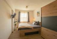 Hochwertige, vollmöblierte 2 Zimmer Wohnung mit Markenküche und großzügiger Sonnenterrasse