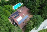 Großzügiges Einfamilienhaus mit Pool, Wintergarten und Doppelgarage mitten im Grünen!