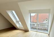Eleganz trifft Lage – Neubau-Dachgeschosswohnung in Toplage