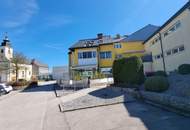 Wohnung mit Loggia und Tiefgaragenplatz direkt im Ortszentrum