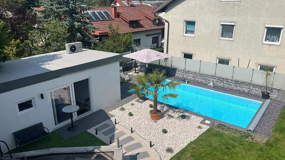 Großzügiges Wohnhaus mit 2 Wohneinheiten und Pool in zentrumsnaher Lage